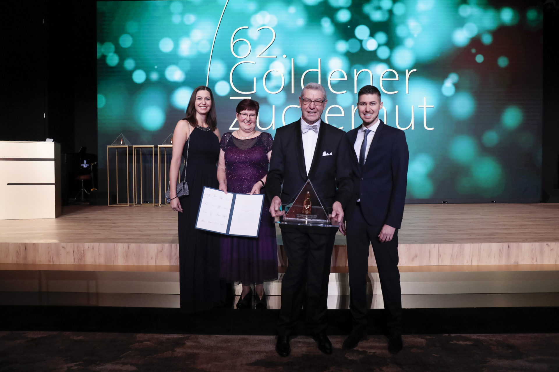 REWE Kaufmann Dieter Schneider im Olymp "Goldener Zuckerhut